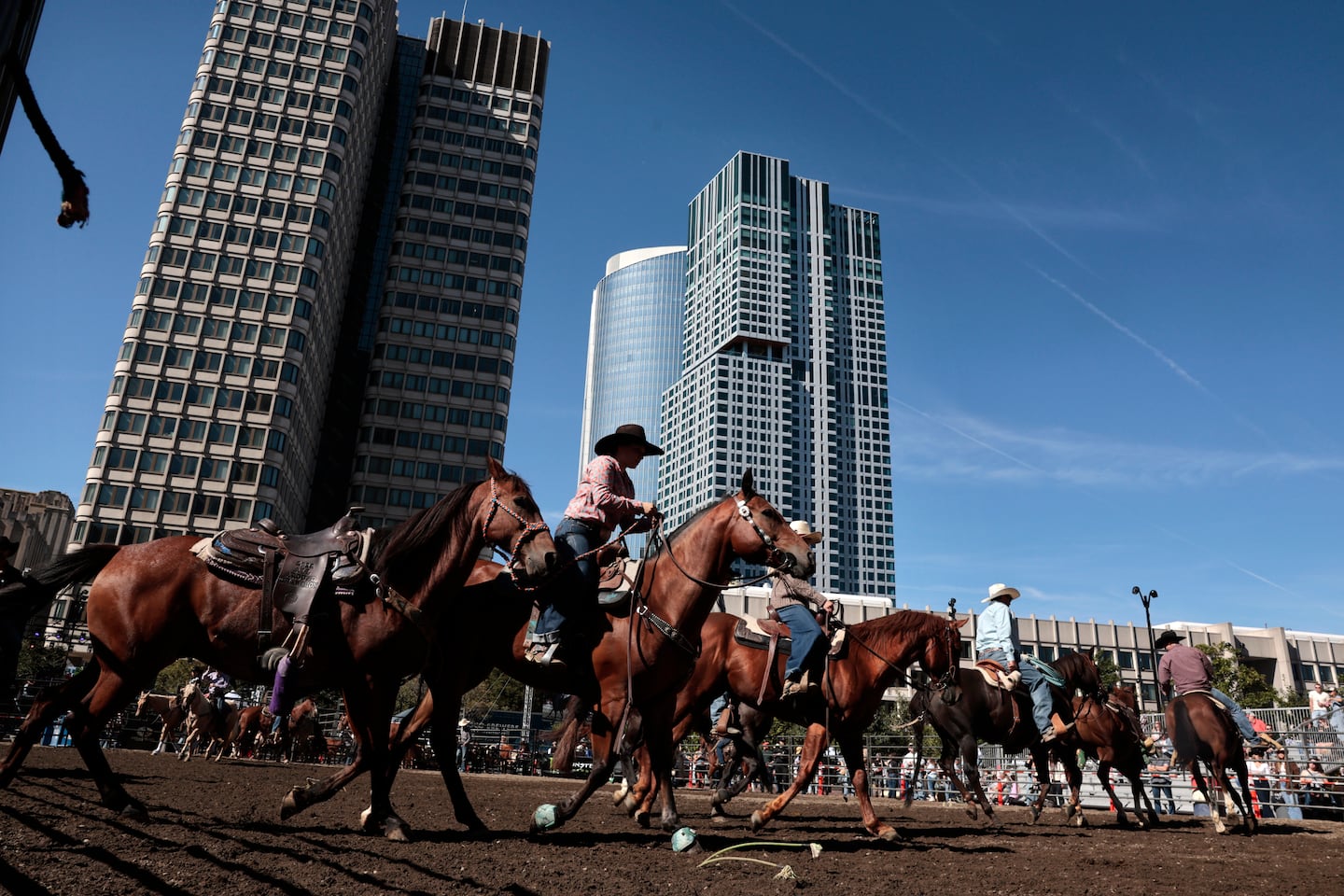 Cowboys saddle up and take on Boston's City Hall in historic rodeo event - The Boston Globe